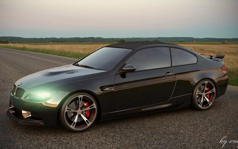 black bmw m3 on country road