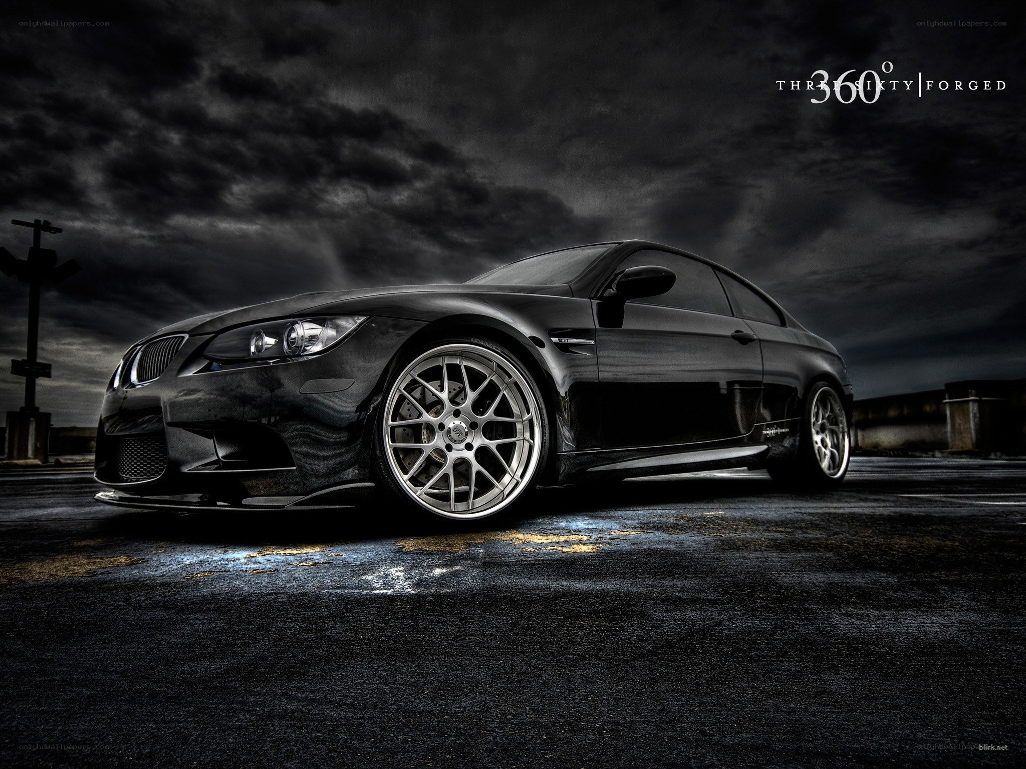Black BMW M3 on dark street
