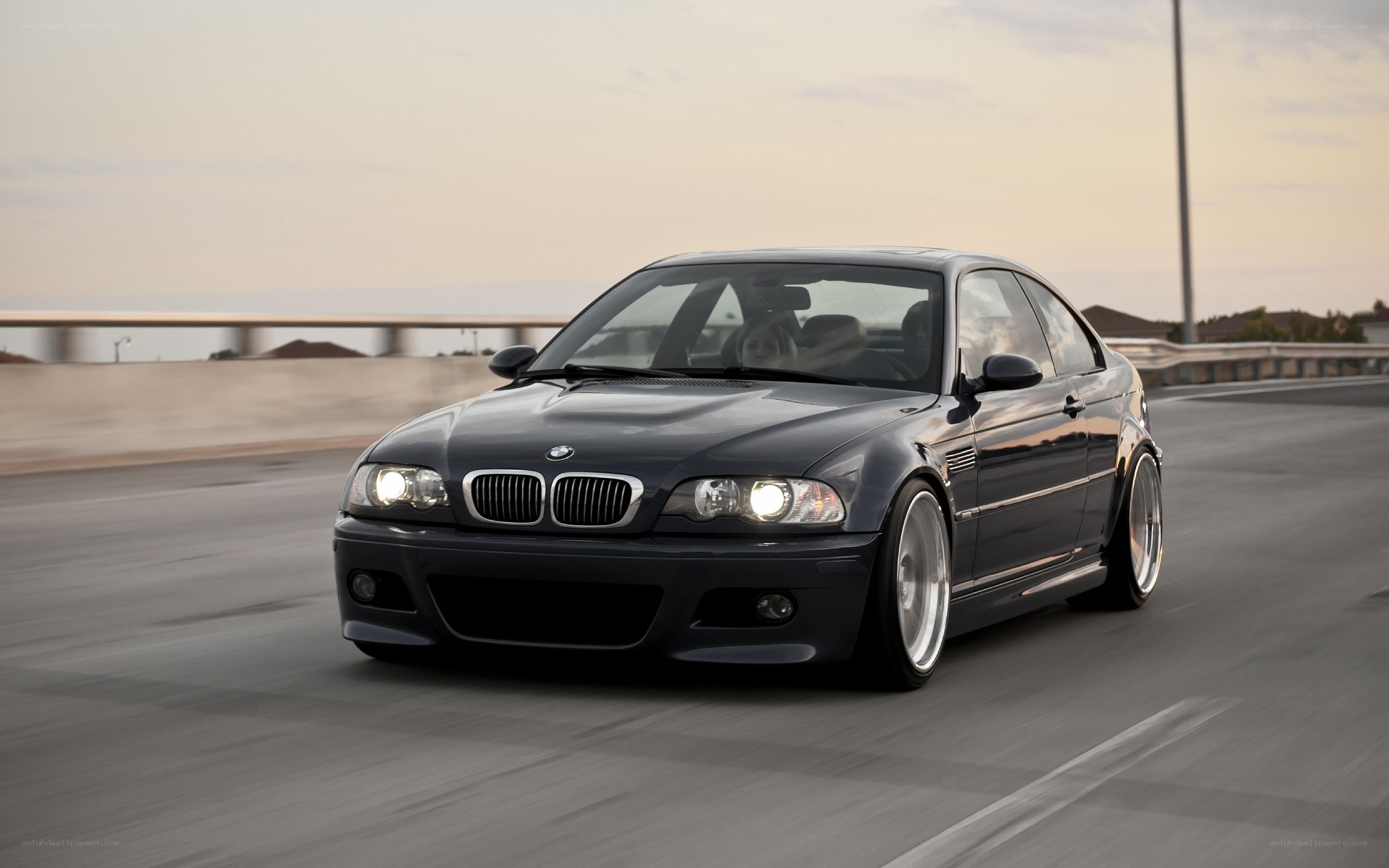 black bmw m3 on road