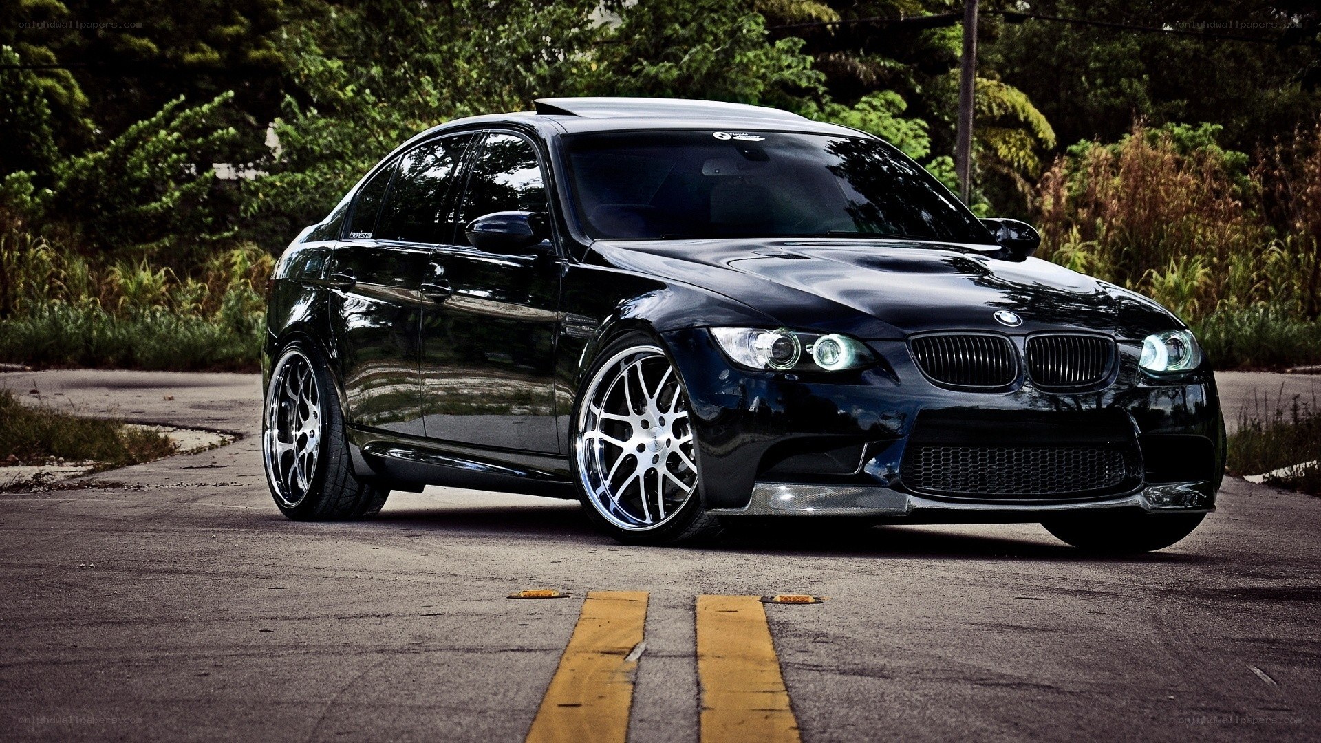 black bmw m3 on road