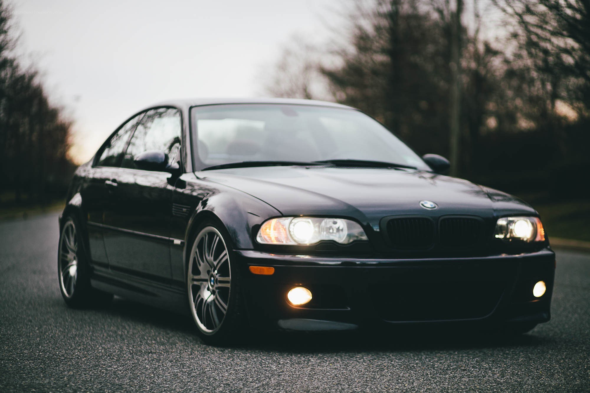 black bmw m3 on road