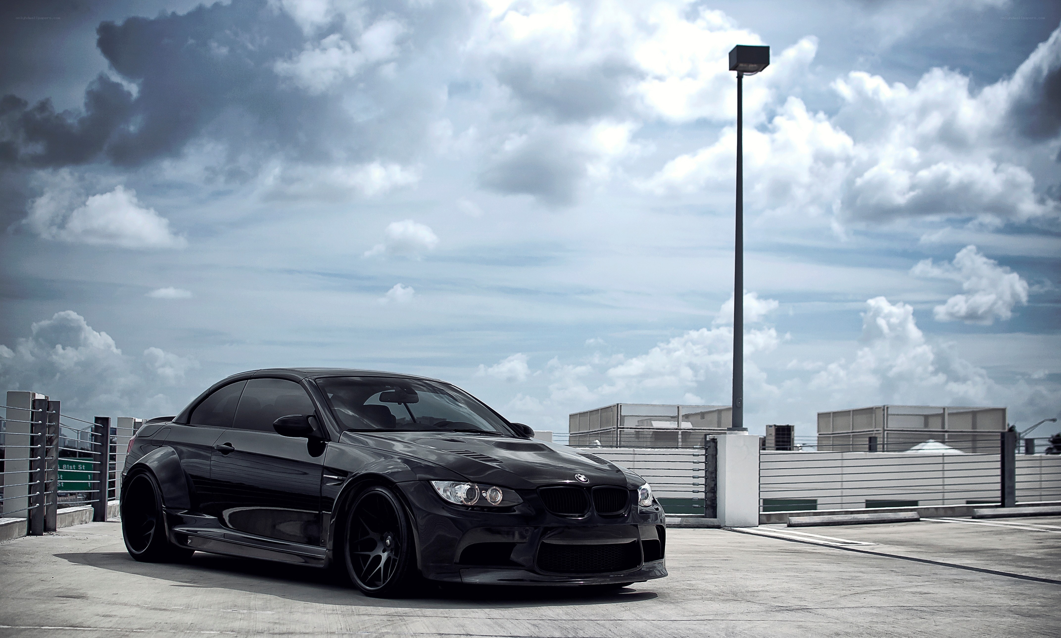 black bmw m3 on rooftop