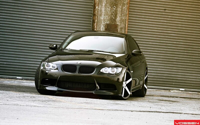 black bmw m3 parked in alley