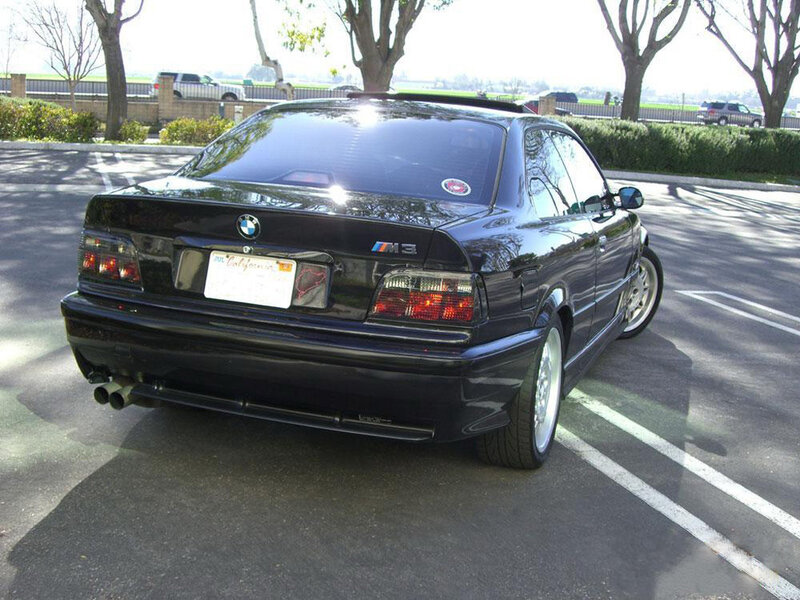black bmw m3 parked in lot
