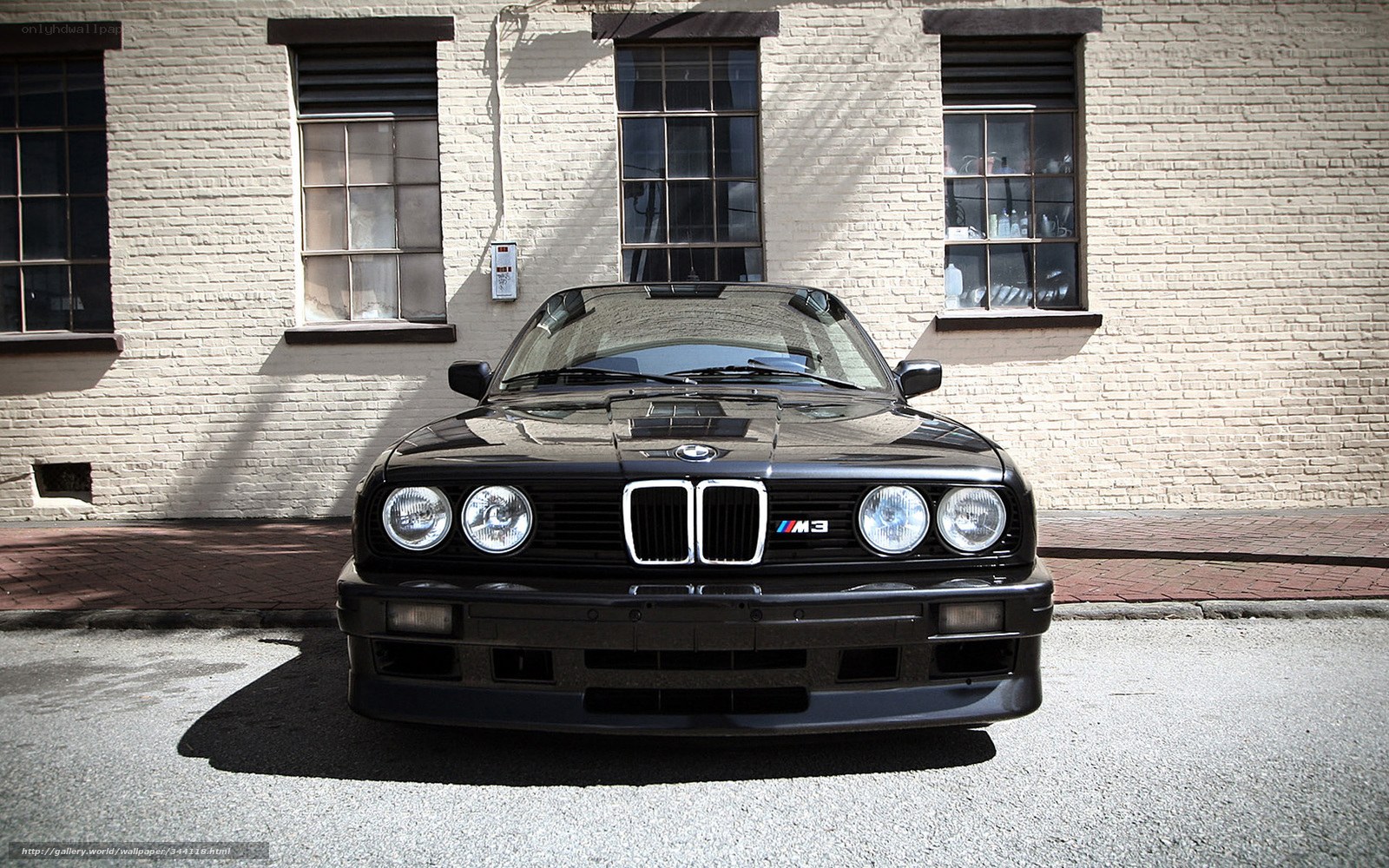 Black BMW M3 parked on street