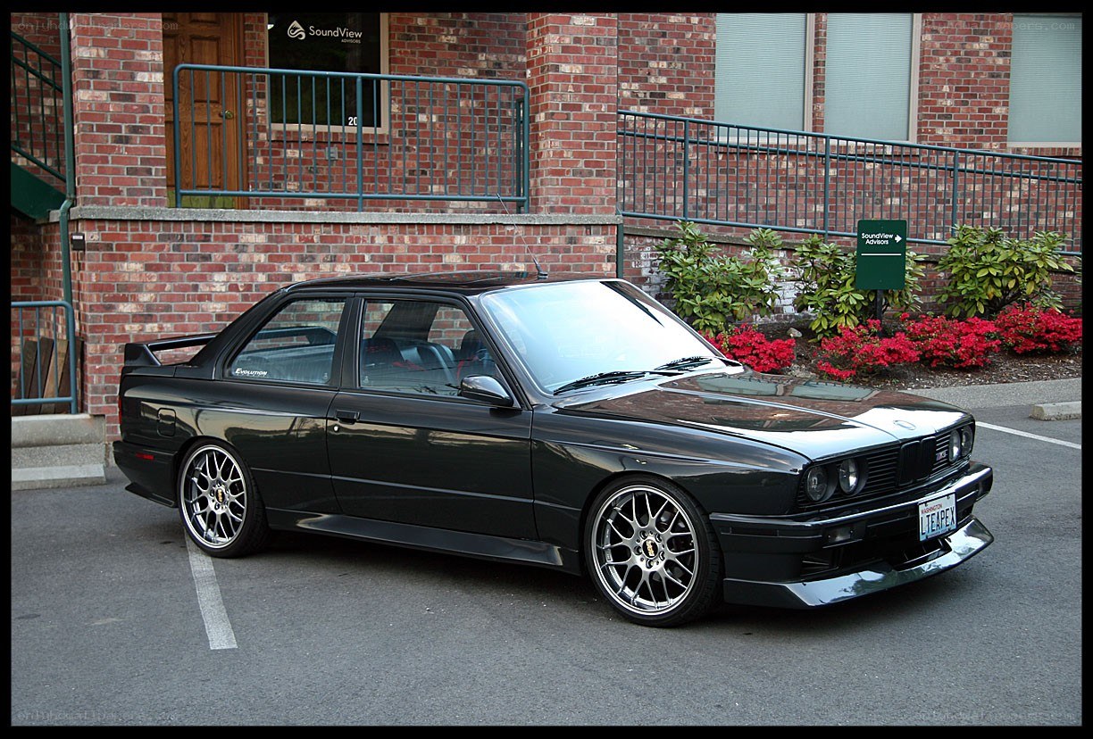 Black BMW M3 parked outside