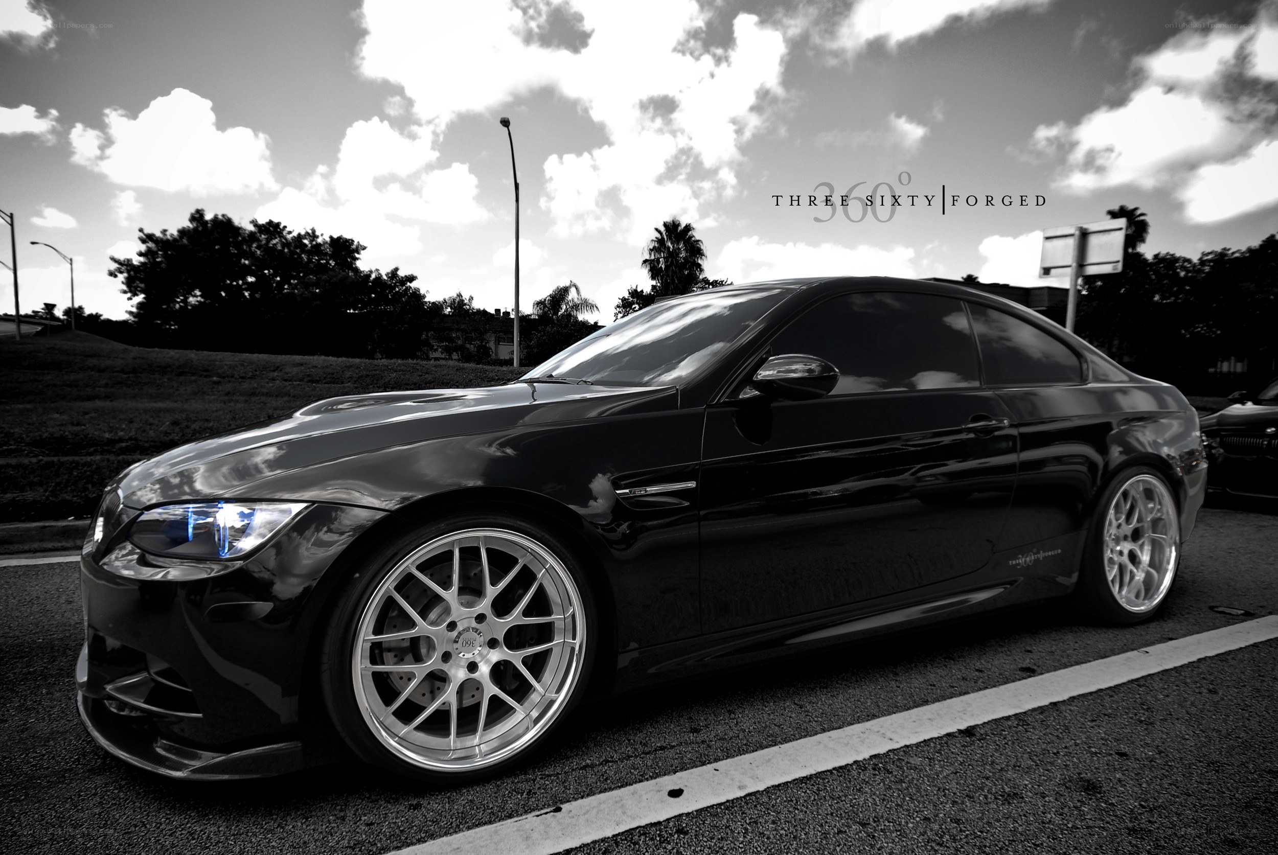 Black BMW M3 with custom wheels