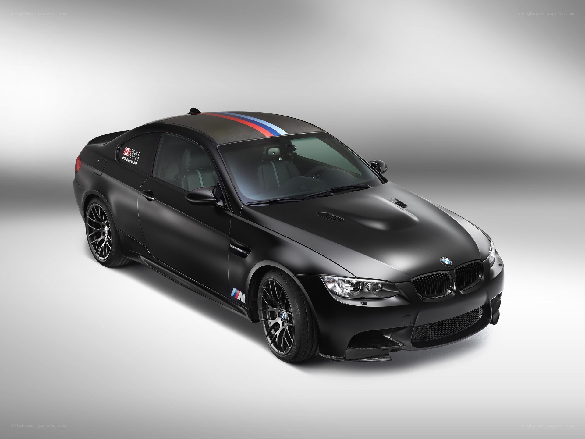 Black BMW M3 with racing stripes
