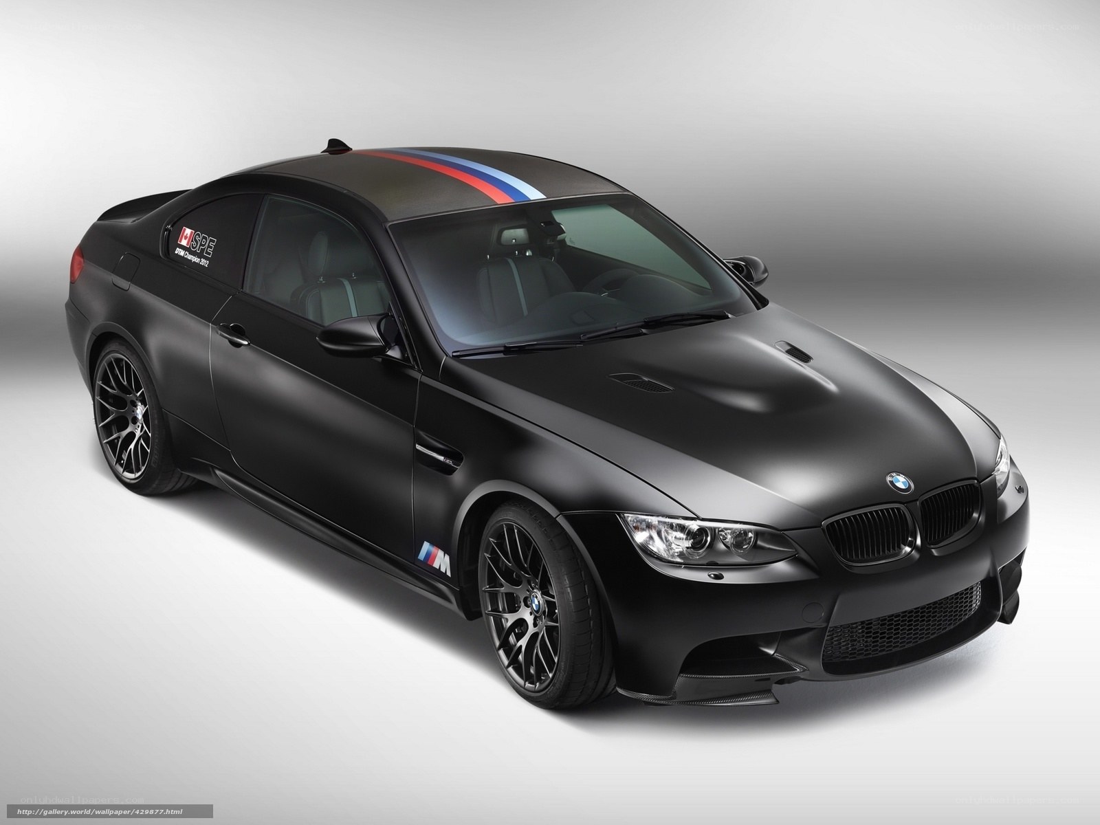 Black BMW M3 with racing stripes