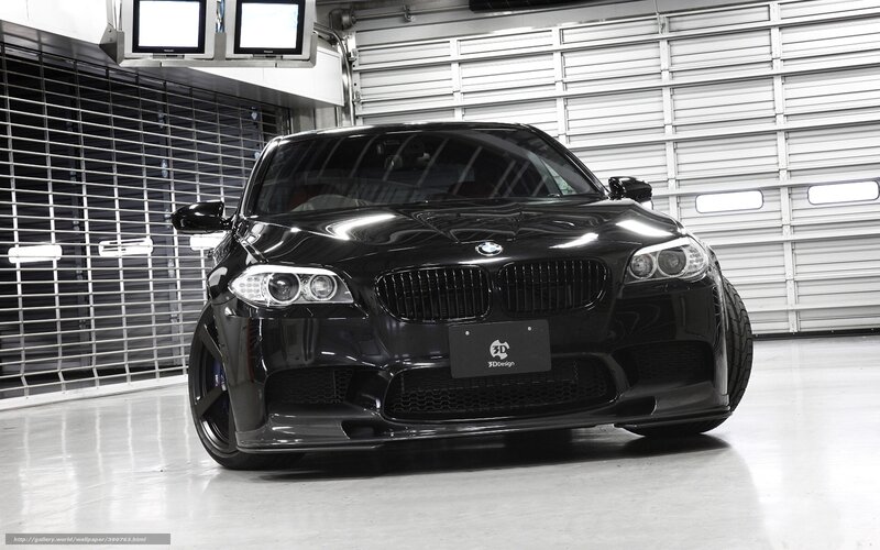 black bmw m5 in garage