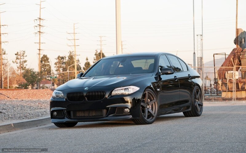 Black BMW M5 on a city street