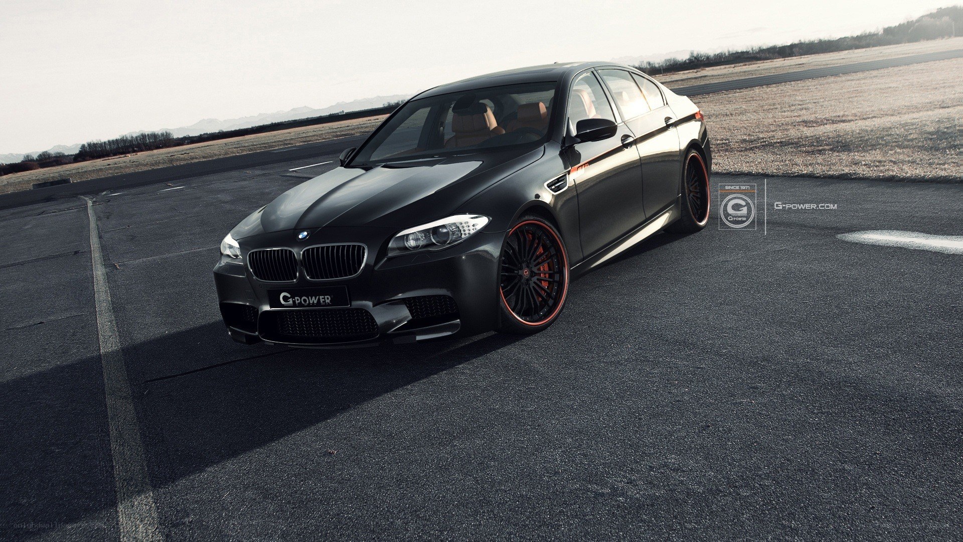 Black BMW M5 on a racetrack