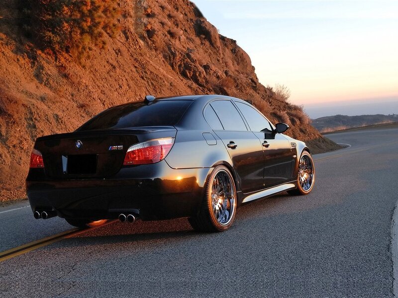 Black BMW M5 on a winding road