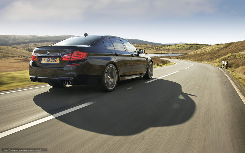 Black BMW M5 on a winding road