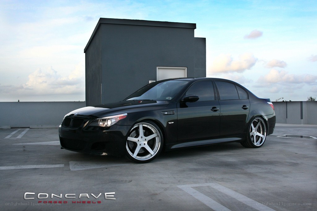 Black BMW M5 on rooftop