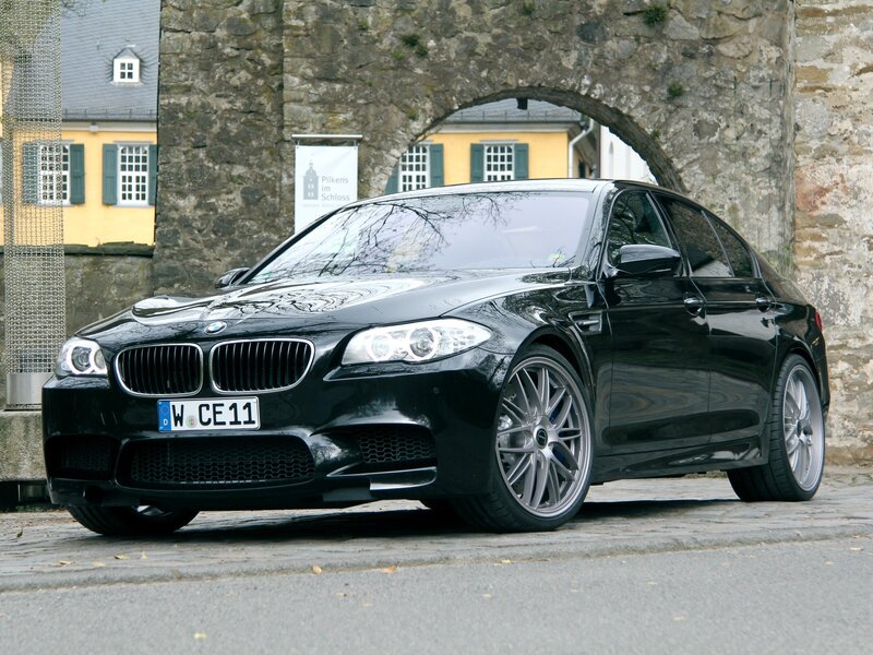 Black BMW M5 parked in town