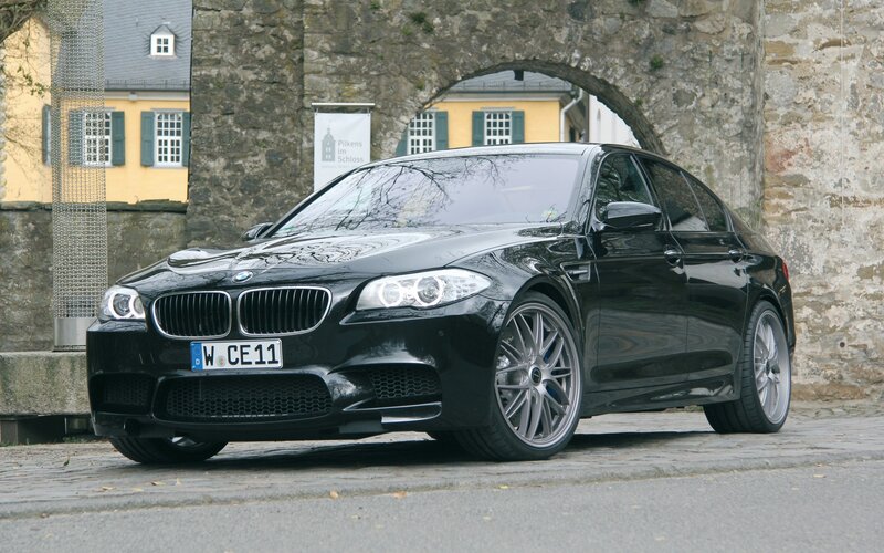 Black BMW M5 parked in town