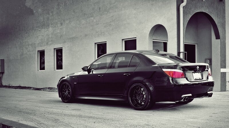 black bmw m5 parked outside