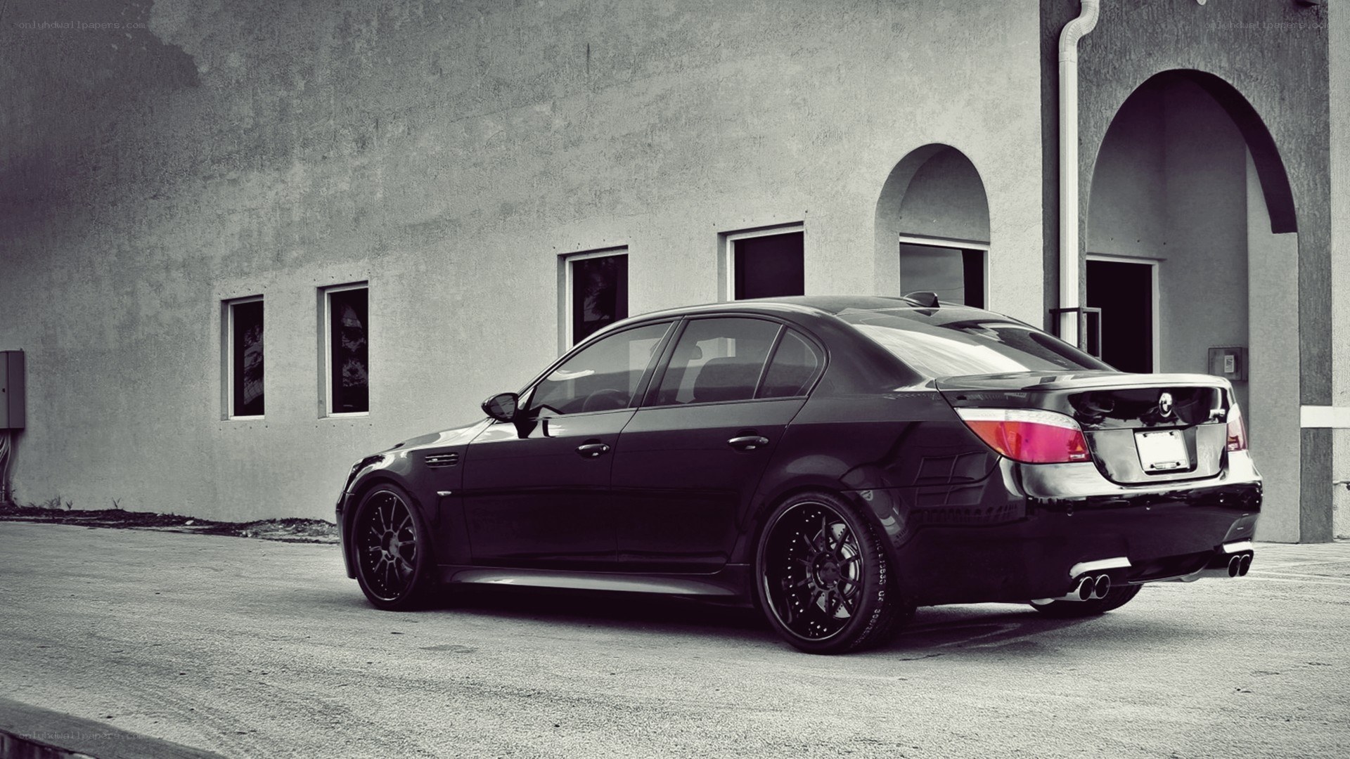 black bmw m5 parked outside