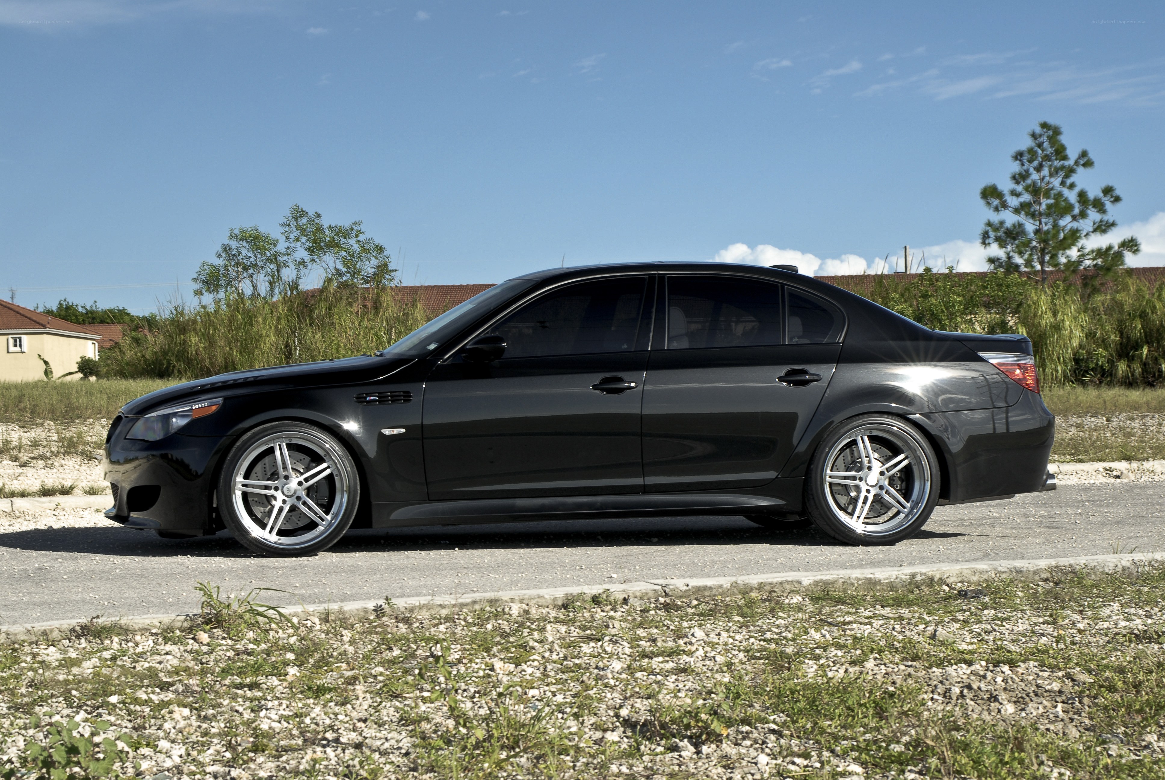 black bmw m5 sedan