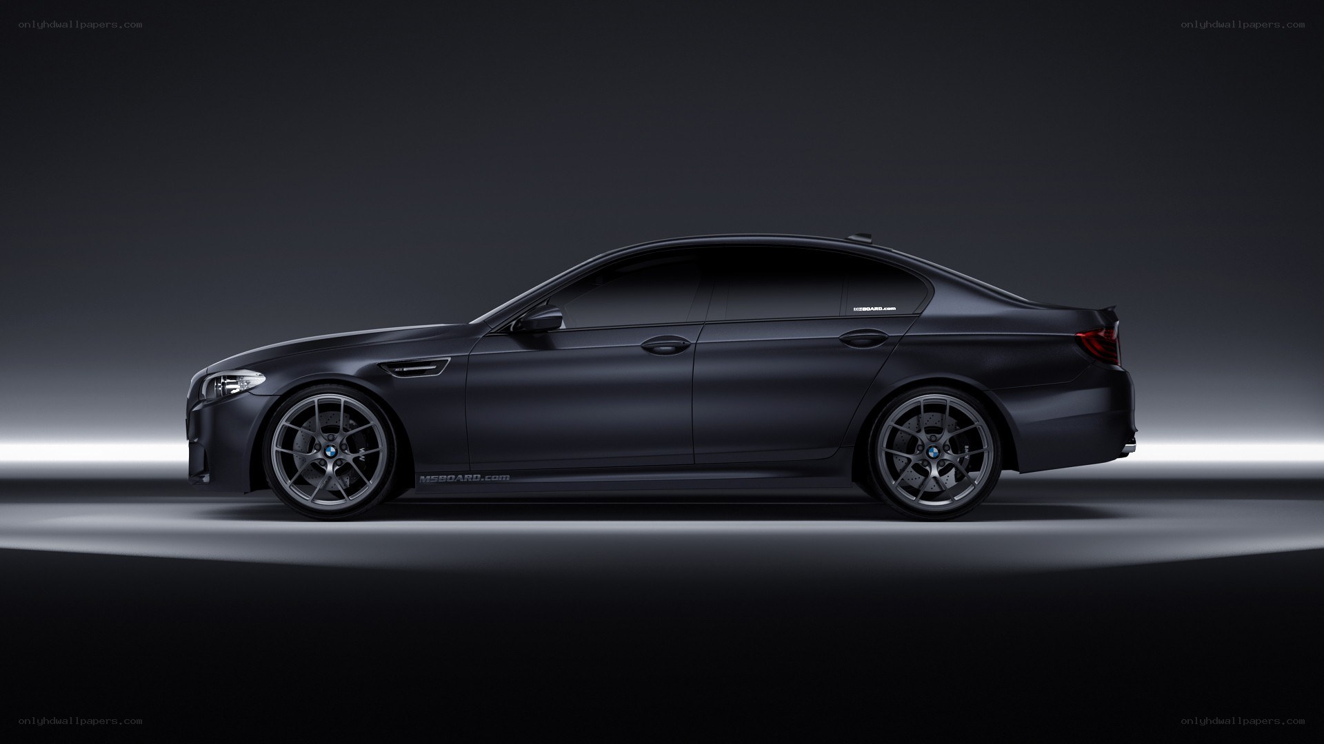 black bmw m5 sedan