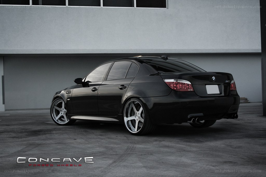 black bmw m5 with concave wheels