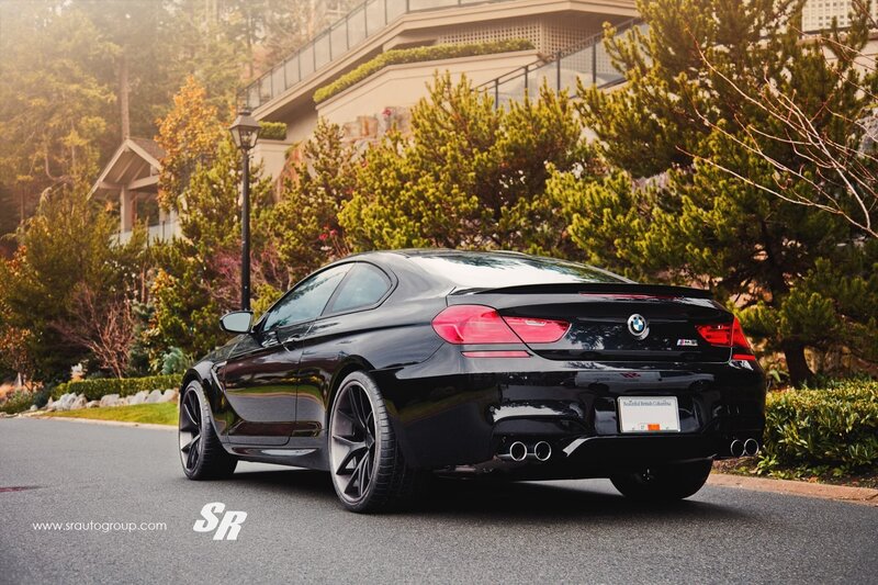Black BMW M6 on a quiet street
