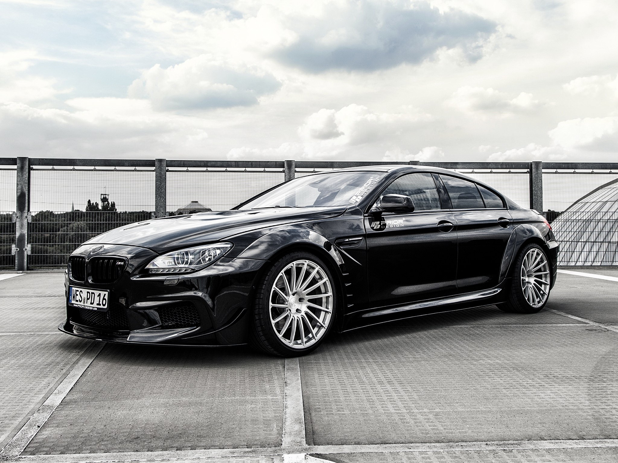 black bmw m6 on rooftop