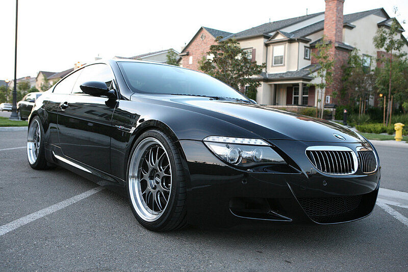 Black BMW M6 parked in driveway