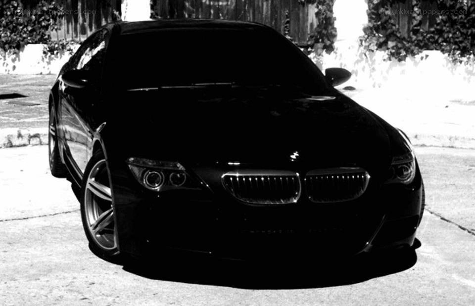 black bmw m6 parked on street