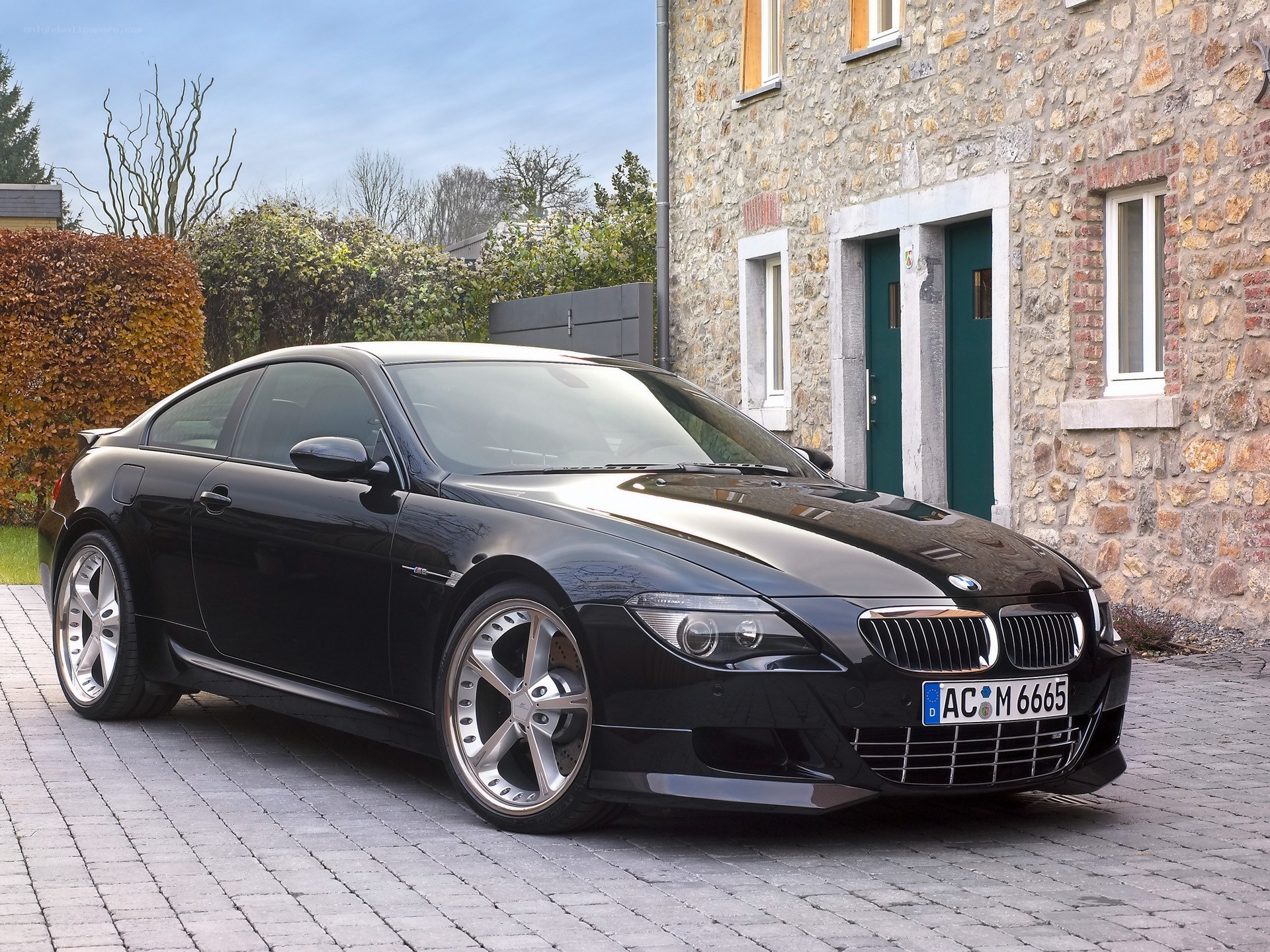 Black BMW M6 parked outside