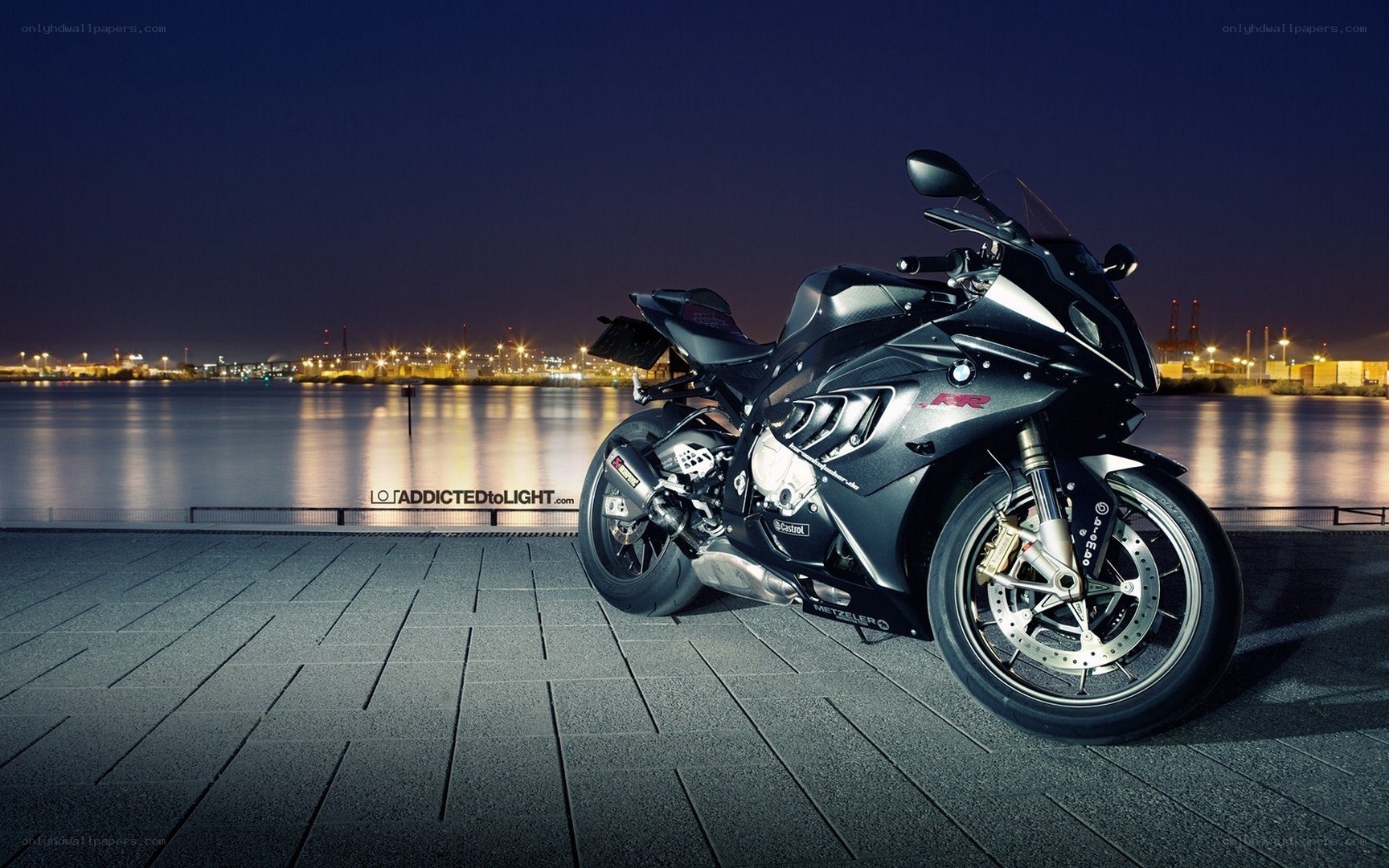 Black BMW motorcycle at night