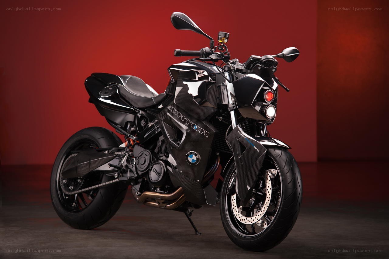 Black BMW motorcycle on red background