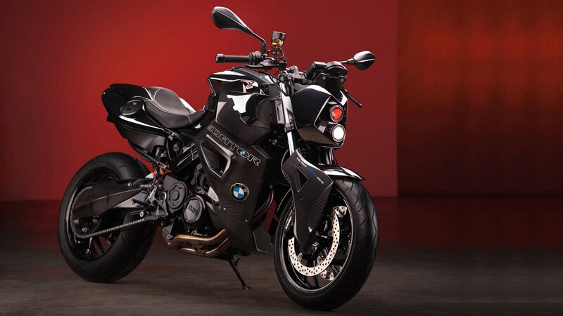 Black BMW motorcycle on red background
