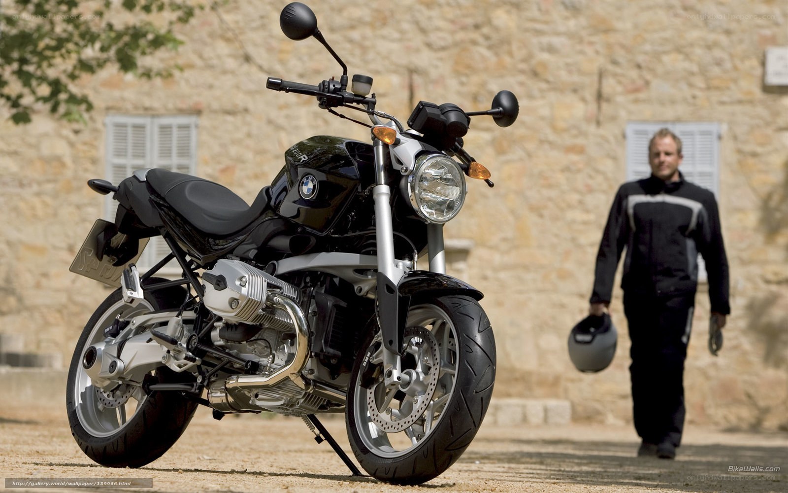 Black BMW motorcycle with rider