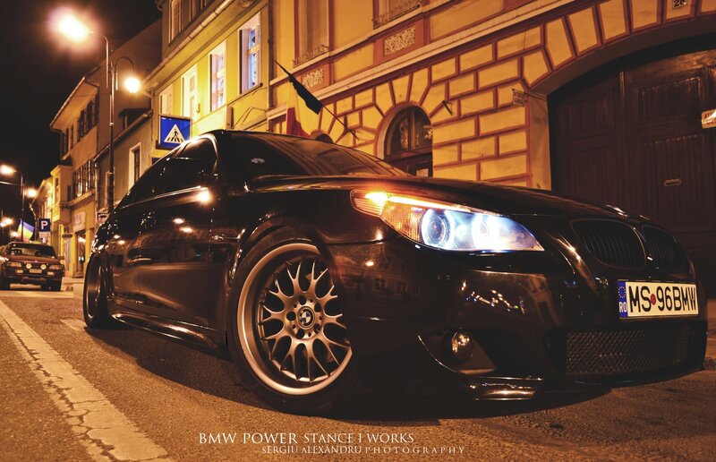 Black BMW on a city street