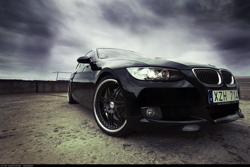 Black BMW on a cloudy day