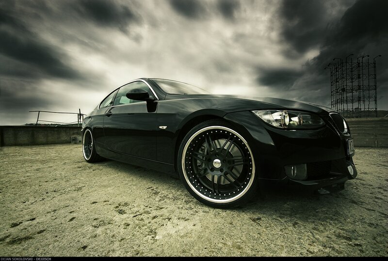 Black BMW on a cloudy day