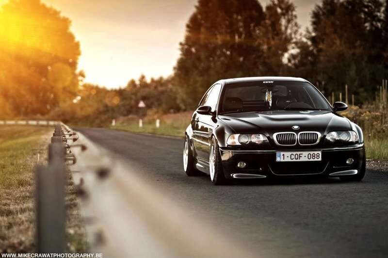 Black BMW on a country road