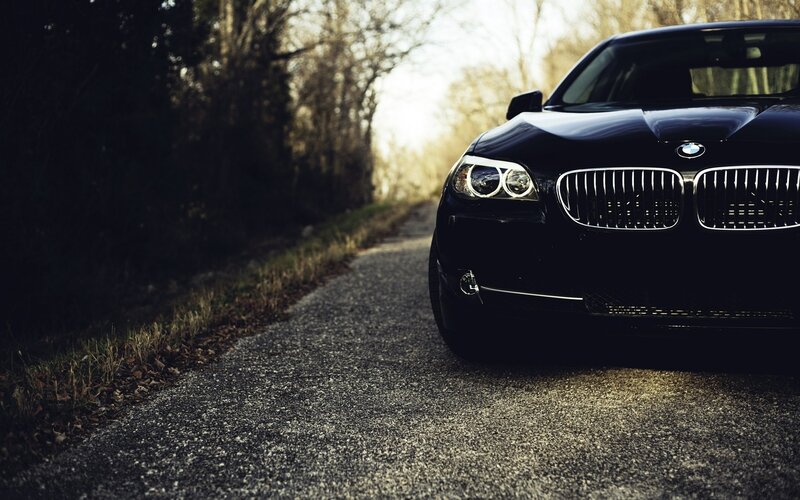 black bmw on a country road