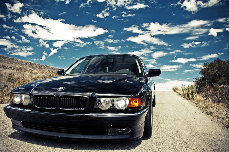 Black BMW on a country road