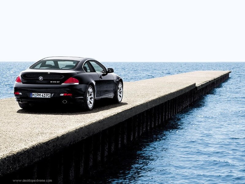 Black BMW on a pier