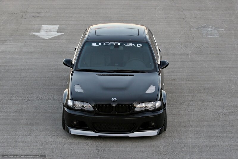 Black BMW on a racetrack