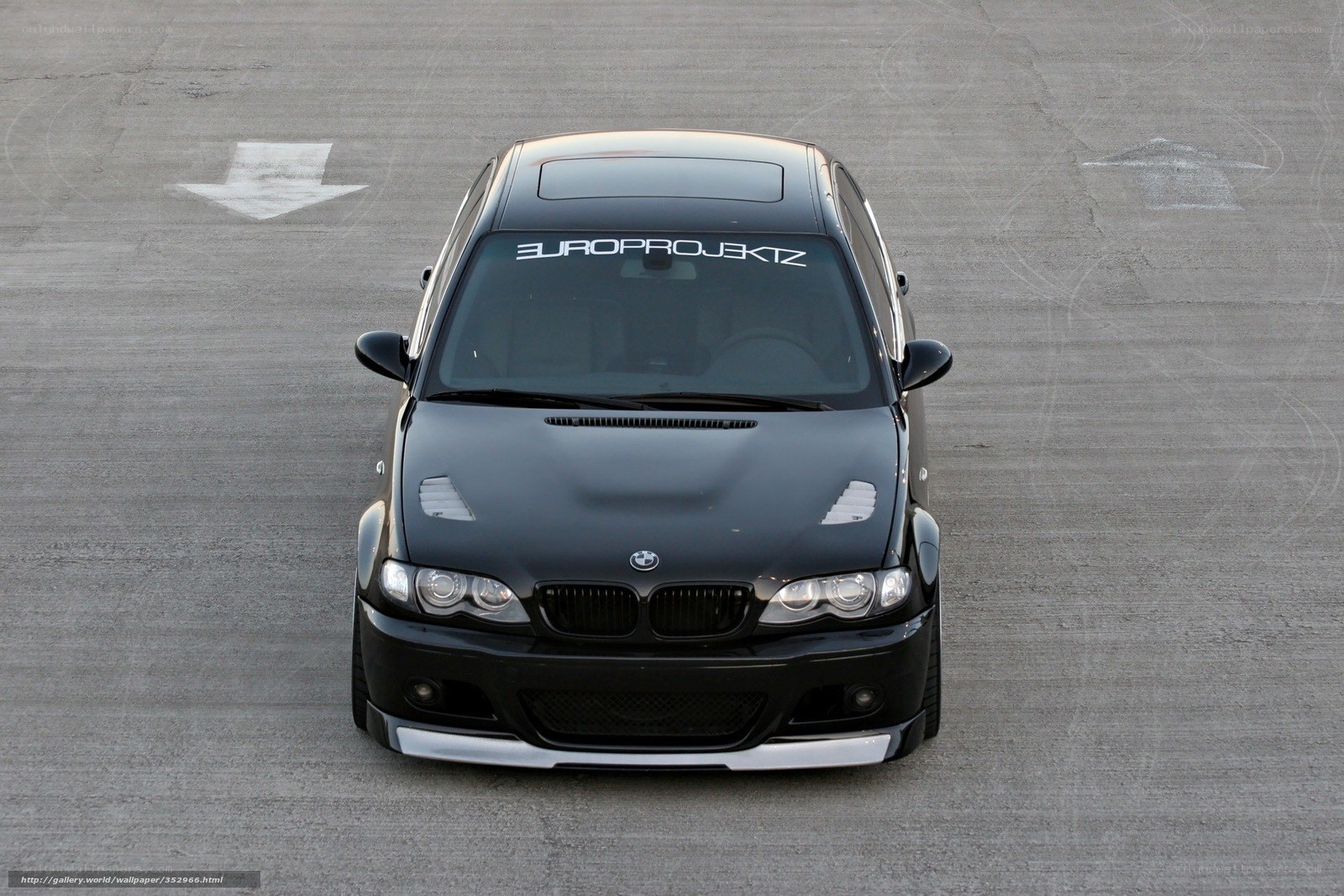 Black BMW on a racetrack