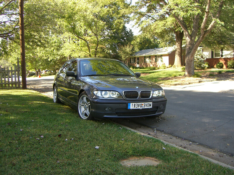 Black BMW on a residential street
