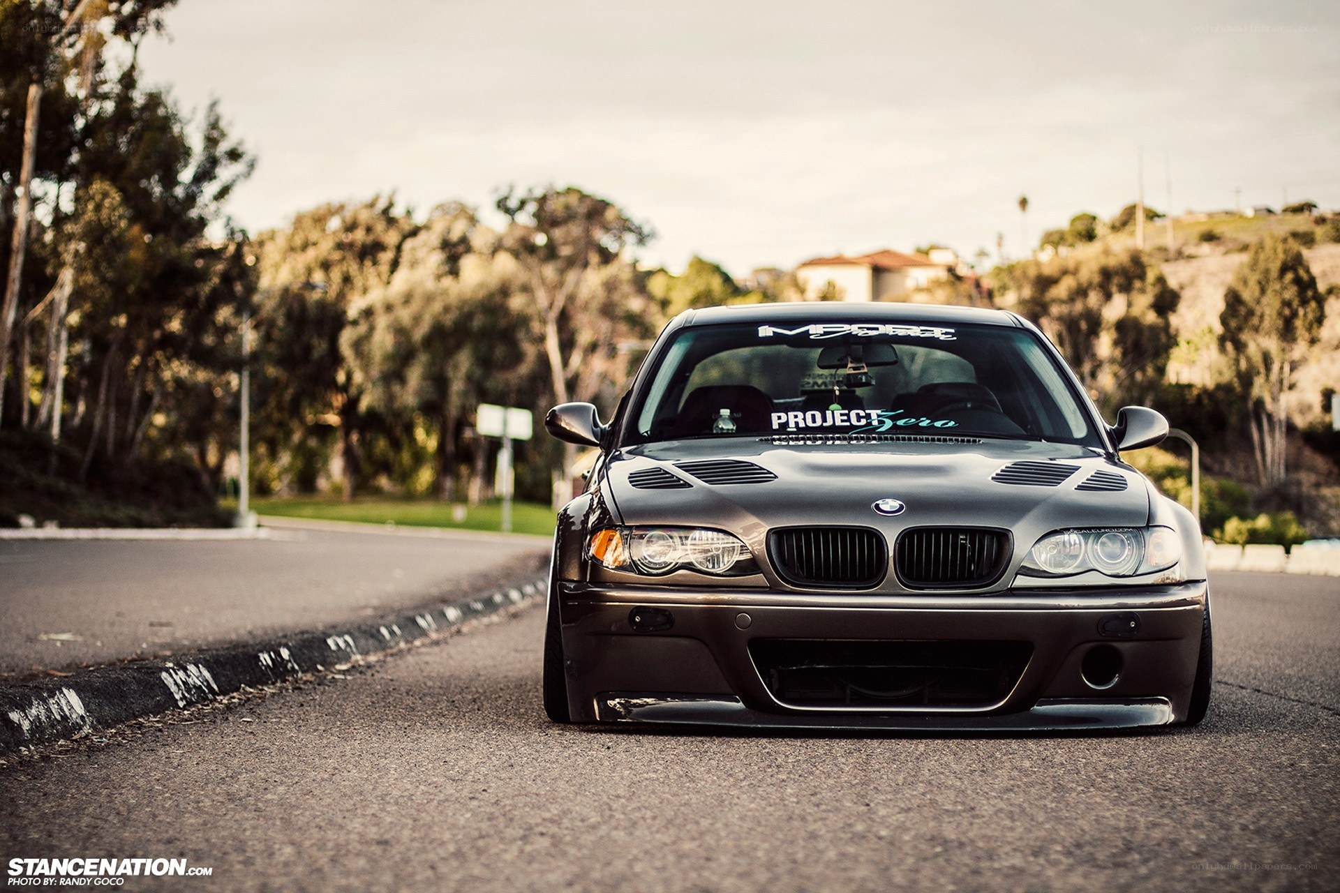 Black BMW on a road