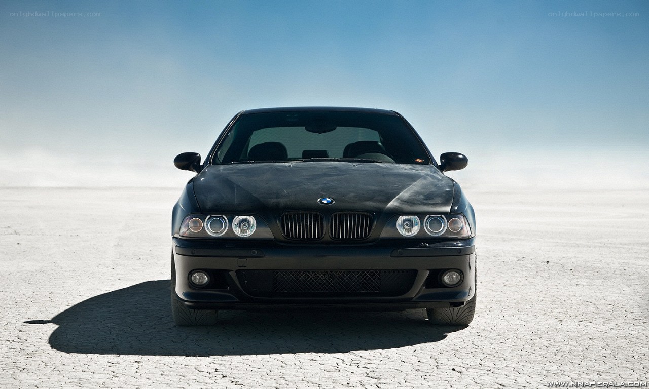 black bmw on desert plain
