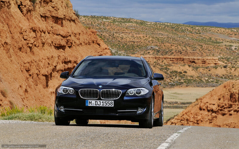 Black BMW on desert road