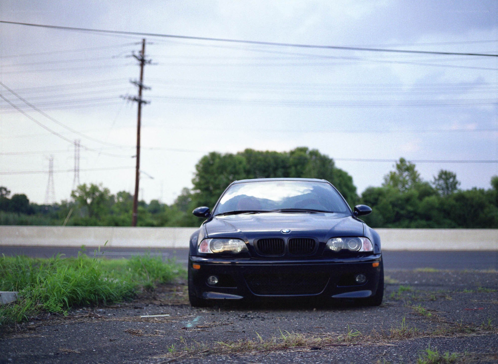 black bmw on roadside