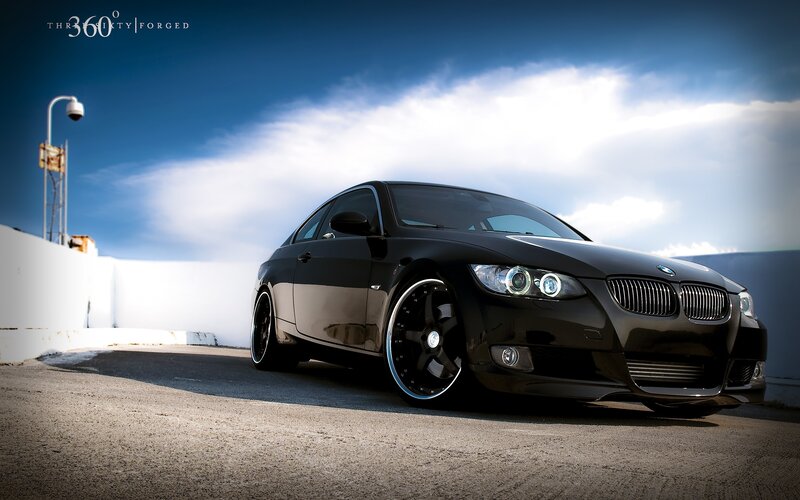 Black BMW on rooftop